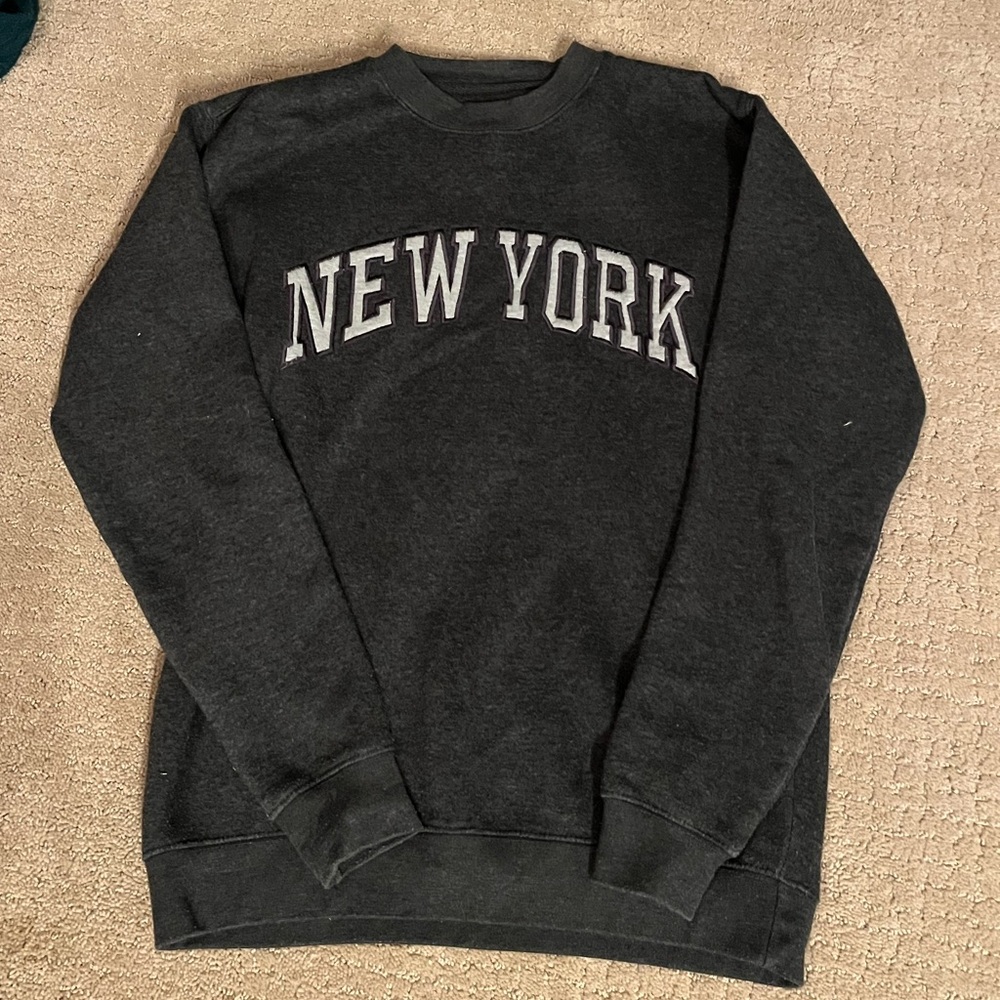 Classic Black Crewneck Sweater with Bold Text